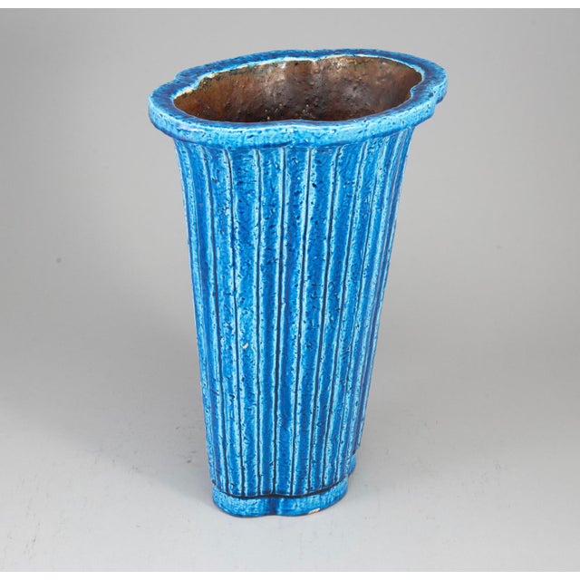 A stoneware vase by Gunnar Nylund, for Rörstrand. Sweden, Circa 1960s. Measures: Width 28, height 40 cm Marked by the...