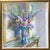 Beautiful, signed Dan Poole still life painting. Colorful flowers set in blue & white vase in home setting. Housed in gold...