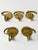 Set of five 'Cortina' brass wall coat hangers designed by Luigi Caccia Dominioni and produced by Azucena, Italy, 1960s I...