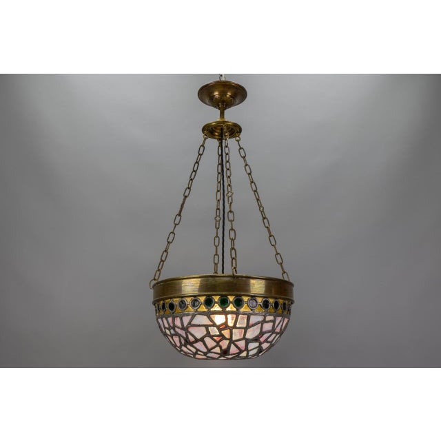 Art nouveau blue & violet stained glass pendant light with brass frame, france, 1920s this stunning art nouveau pendant...