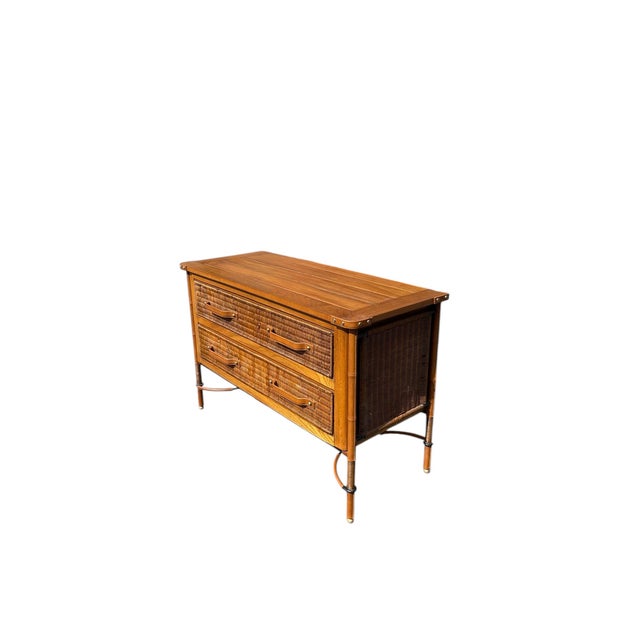 Stitched Leather and Rattan Chest of Drawers by Jacques Adnet, 1955, in Good conditions. Designed 1950 to 1959 This piece...