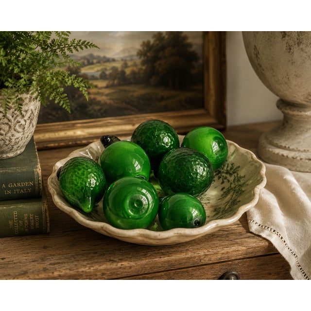We love this set of seven blown and pressed glass fruit . 2 tomato, 1 apple, 1 lemon, 2 oranges and 1 pear showcase a...