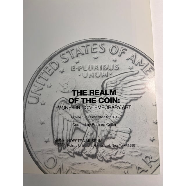 The Realm of the Coin: Money in Contemporary Art by Coller, Barbara. Published by Hofstra Museum, 1991, New York. First...