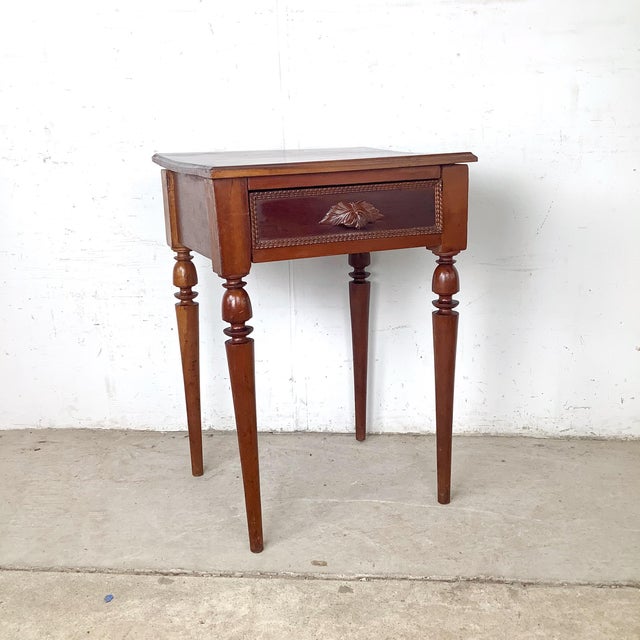 Steeped in the quiet elegance of rural French craftsmanship, this charming side table dates to the mid-to-late 19th...