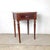 Steeped in the quiet elegance of rural French craftsmanship, this charming side table dates to the mid-to-late 19th...