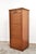 Despite its age, it is still in excellent condition. The oak cabinet features a smoothly operating roller door, a working...