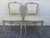 Set of six painted French dining chairs, c.1930’s Comprising of two armchairs and four side chairs. Having a painted white...