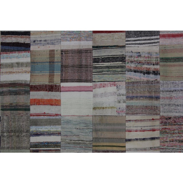 A beautiful Vintage Patchwork Rug. It's in very good condition, practically new. This Patchworks rug is produced of older...