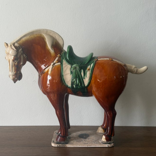 Antique Tang Sancai Terracotta Horse in Tri-Color Glaze - Exquisite Form and Detail Measures approx: 17H x 20L x 7D Please...