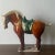 Antique Tang Sancai Terracotta Horse in Tri-Color Glaze - Exquisite Form and Detail Measures approx: 17H x 20L x 7D Please...