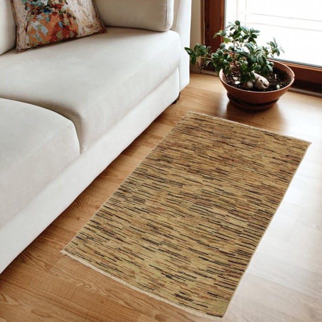 Transform your home's interior with a stunning hand-knotted Gabbeh rug. These rugs are meticulously crafted with bold...