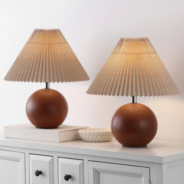 Illuminate your space with elegance and style through the Rory table lamp set. At 17.25 inches tall and featuring a dark...