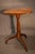 An American birch Sheraton candle stand on a medium turned pedestal with arching spider legs. Light older finish, with...