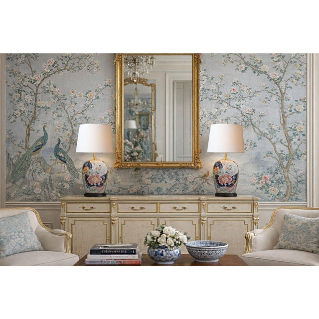 Offering a remarkable RARE pair of completely restored vintage hand painted Chinese Tobacco Leaf lamps, circa Mid to early...