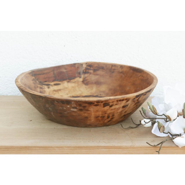 There is a soulful weight to this old wooden bowl that only comes with age. Originally hand-carved and likely used in a...