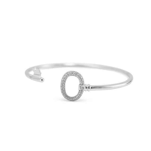 Brand: Tiffany & Co. Gender: Ladies Metal Type: 18K White Gold Length: 6.50 inches Width: 14.40 mm Thick: 2.00 mm Weight:...