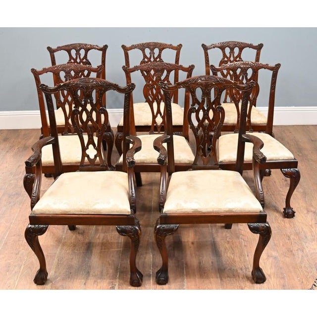 Fine set of eight Chippendale Revival mahogany dining chairs Comprising six side chairs and two matching armchairs We have...
