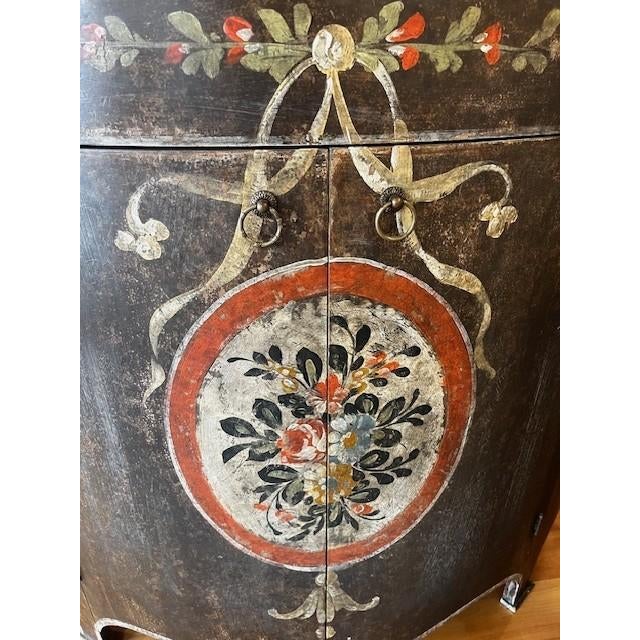 Dark wood hand painted demilune. Half circle shape with one drawer above doors.