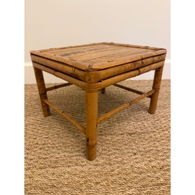 Tortoise rattan plant stand or telephone table. Great tucked under a coffee table. From Hong Kong. In excellent condition.