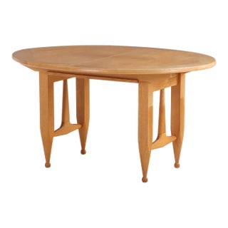French Oak Dining Table by Guillerme & Chambron — Oval Top With Two Original Leaves, c.1960 For Sale