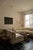 A sculptural vintage three-piece modular sectional sofa featuring a sweeping curved silhouette, generous proportions, and...
