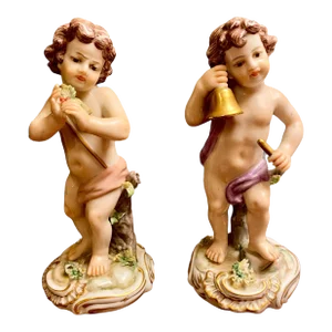 A Pair of Antique Italian Capodimonte Porcelain Cherubs
