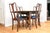 A small vintage Queen Anne style extendable dining table with elegant cabriole legs and two extension leaves and four...