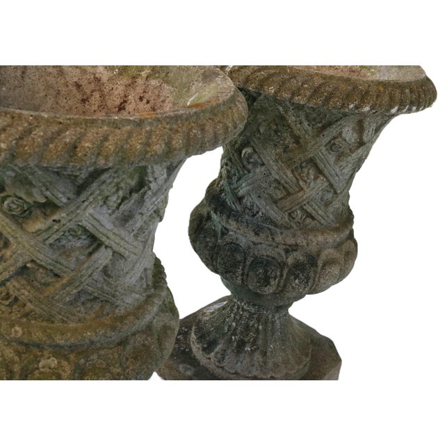 Mid 20th Century Vintage Large Concrete Garden Urns With Floral Rosetta Relief and Tudor Weave Design- A Pair For Sale - Image 5 of 13