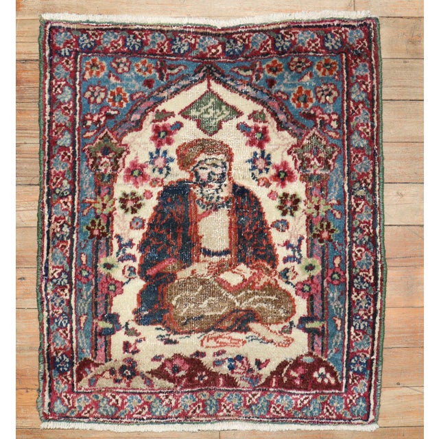 An early 20th century Persian pictorial rug from the city of Isfahan Measures: 1'7'' x 1'10''.
