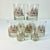 This set of 7 Lowball Whiskey Glasses feature a raised Bronzed-Gold colored Tall Mast Ship. The set also has 2 Shot...