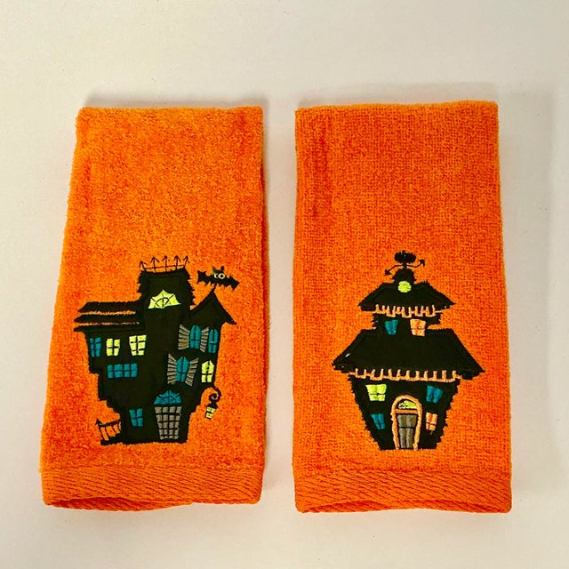 These are a pair of Halloween Guest Tip Towels. They feature two different Haunted Houses on a bright orange terrycloth...