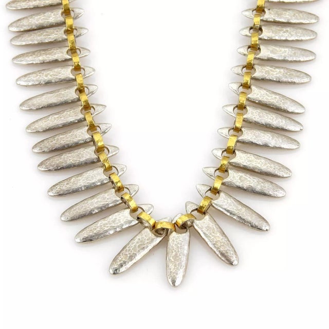 This is a unique and interesting necklace by Gurhan from the SUNFLOWER collection. It is crafted from solid sterling...