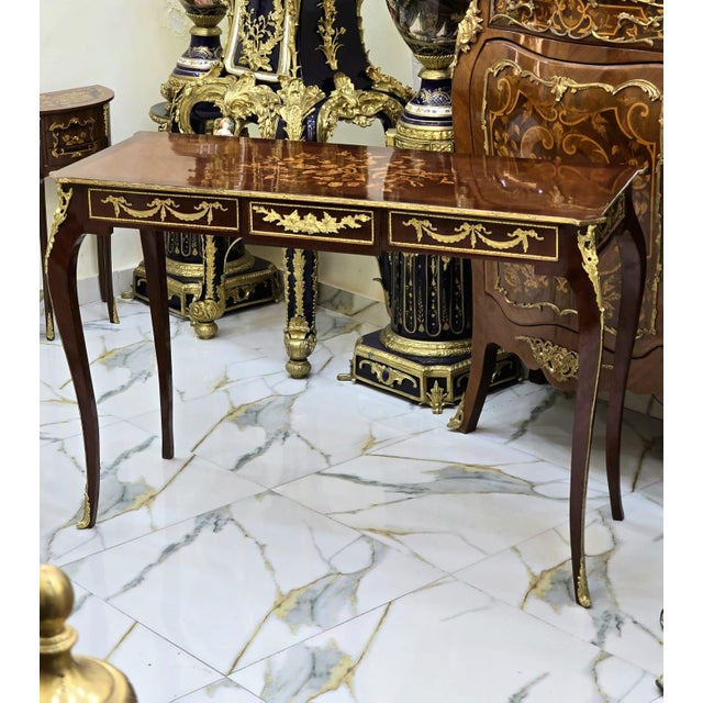 Add timeless sophistication to your interior with this beautifully handcrafted Rococo-inspired console table, designed...