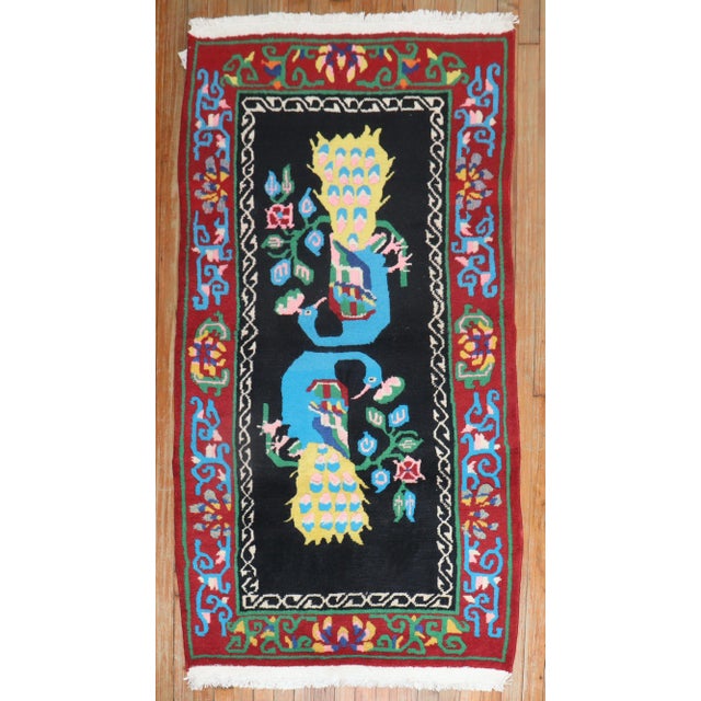 Colorful late 20th century Tibetan rug. Measures: 3' x 5'6".