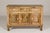 Anglo-Indian style richly inlaid mango wood buffet with three drawers over three doors and dark patina. This Anglo-Indian...