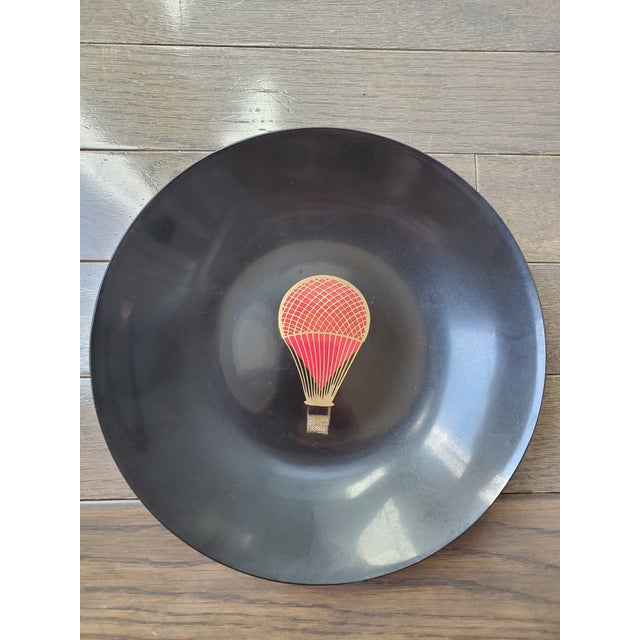 This vintage Couroc of Monterey Hot Air Balloon plate is a collectible mid-century modern piece featuring hand-inlaid...