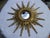 A large, antique wooden sun mirror, beautifully crafted in three dimensions and with a dream patina. Inside was a light...