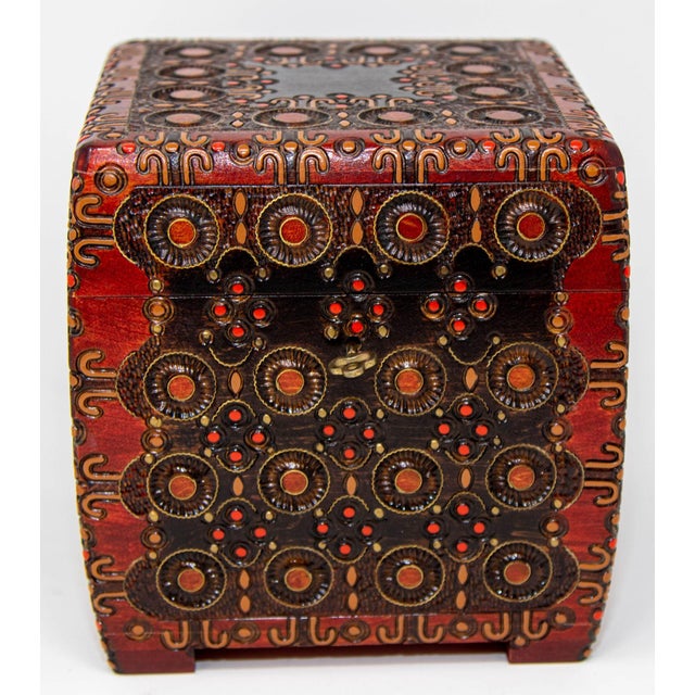 Hand-Carved vintage Folk Art wooden Tramp Art style storage box from Poland. This handcrafted Tramp Art style box is...