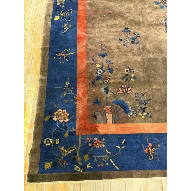 "This is a stunning and authentic room-sized antique Chinese Art Deco rug, dating back to circa 1920. Measuring a generous...