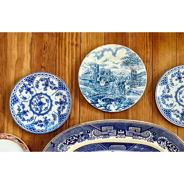 A striking and historic collection of English antique and mid-century decorative wall plates. 11 plates and bowls in total...