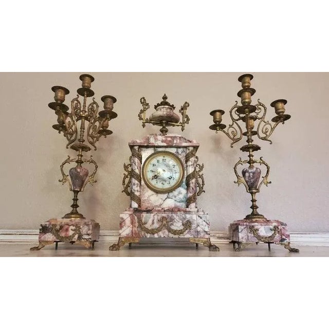 A stunning, large, and original, French three piece mantel set from the late 19th century. Circa 1870 The Napoleon III...