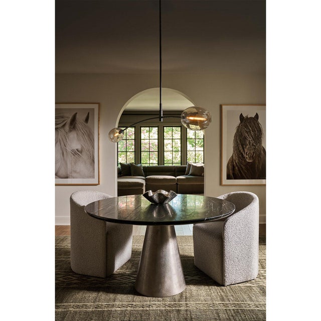 Artemis blends sleek design with the allure of artisan-crafted glass. Its open-ended Champagne glass globes add moody...