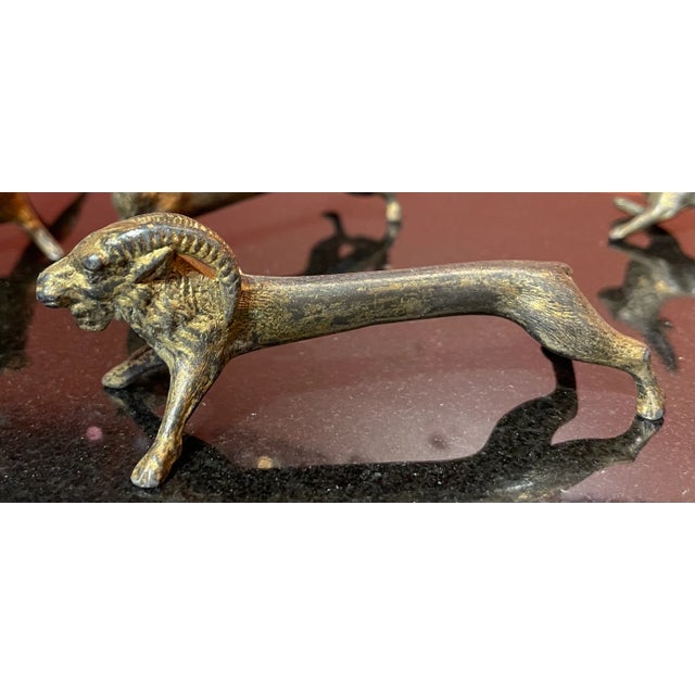 This is an adorable set of six French knife rests depicting a ram, a squirrel, a rabbit, a boar and a mystery animal or...