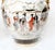 Decorative pair of Japanese Satsuma style vases with rounded bodies and flared rims Each features detailed figural scenes...