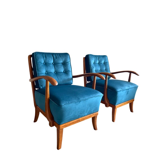 Elegant Art Deco armchairs designed by Gyula Kaesz in the 1930s. This exceptional piece features a beautifully restored...