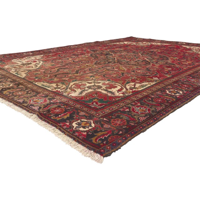 76235 Vintage Persian Heriz Rug, 07'09 x 11'02. Perpetually posh meets stylish durability in this hand knotted wool...