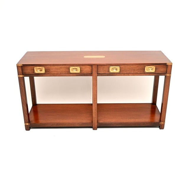 An excellent antique military campaign style console table. This was made in England, it dates from around the 1930-50’s...