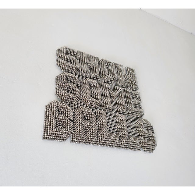 “SHOWSOMEBALLS” Wall mounted heavy metal sculpture. Inspired by classic heavy metal band-logo's and record-sleeve artwork....