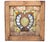 Pair of Arts & Crafts stained glass windows with unfinished wood frames. The panels feature a range of marbled glass in...