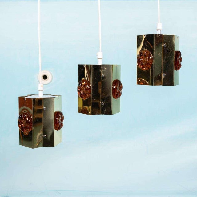 Unique midcentury design from the sixties; these hanging lamps made by the Danish company Vitrika and made of brass and...